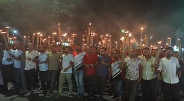 বন্দর রক্ষায় মশাল মিছিল