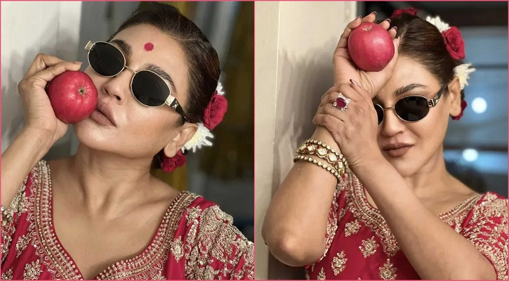 লাল আপেল হাতে রহস্যময় ক্যাপশনে হাজির জয়া