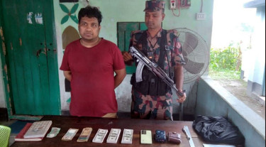বাংলাবান্ধা চেকপোস্টে ইউএস ডলারসহ ভারতীয় নাগরিক আটক