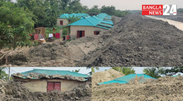 নদী খননের মাটিতে চাপা পড়েছে আশ্রয়ণ প্রকল্পের ঘর